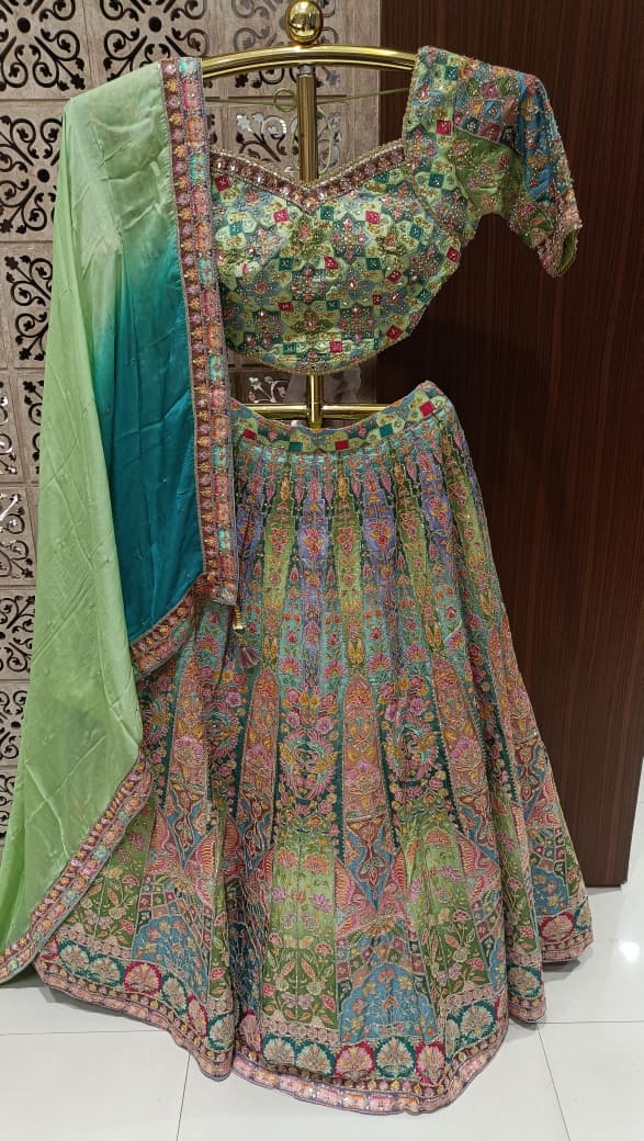 Multi-Color Pastel Embroidered Lehenga Choli Set.