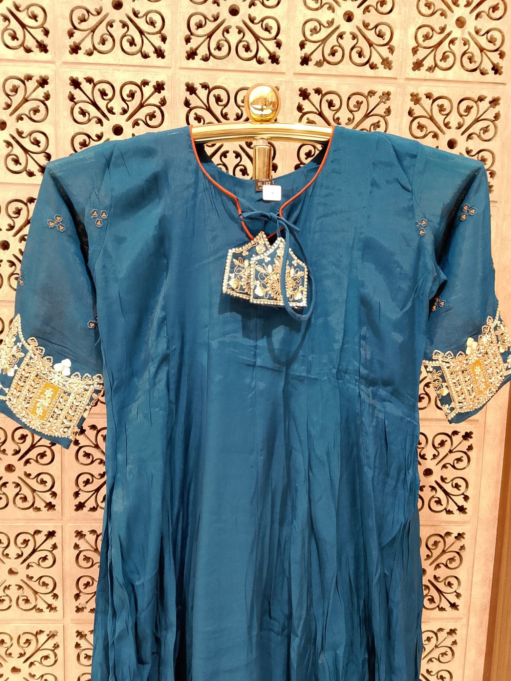 sophisticated peacock blue Anarkali suit set  luxurious Mul Chanderi fabric.