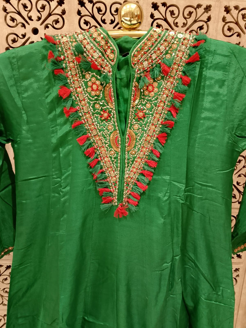 vibrant emerald green Anarkali suit set luxurious Satin silk-blend fabric.