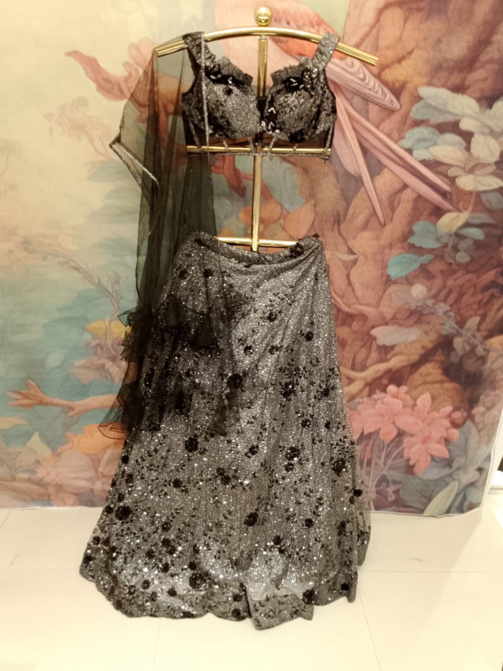 glamorous charcoal black and silver metallic lehenga set Cocktail parties, reception nights, glamorous sangeet events, and modern festive parties.
