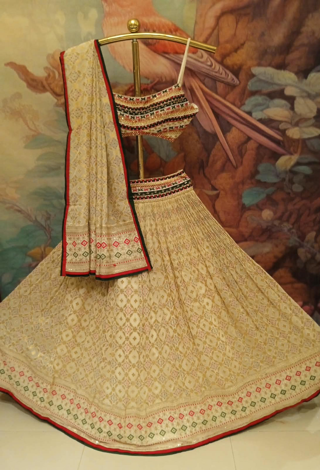 elegant ivory and gold Patola-inspired lehenga choli  premium lightweight georgette.