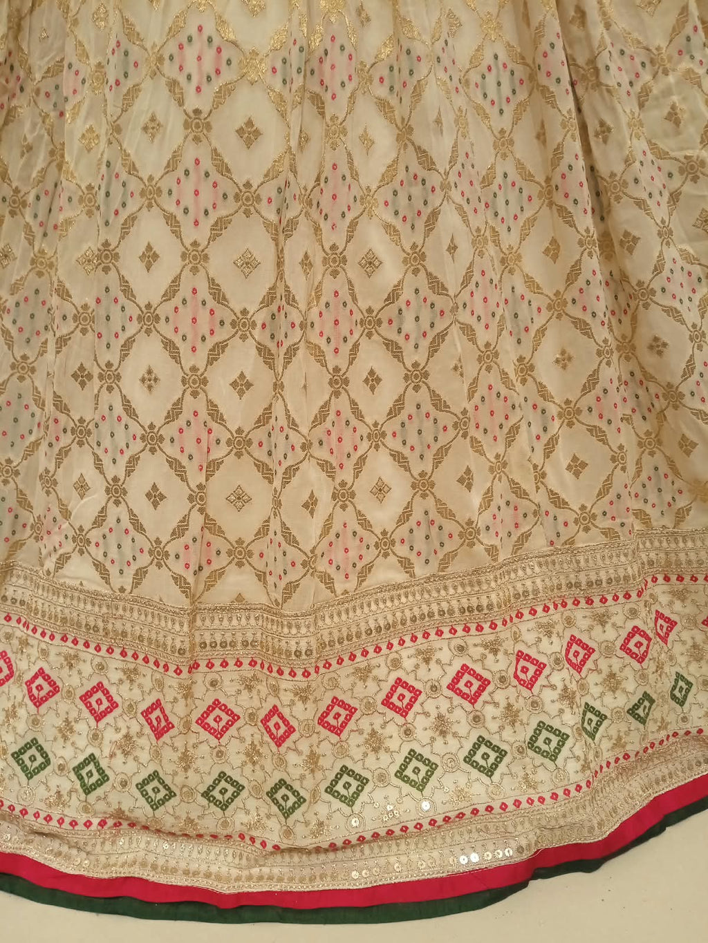 elegant ivory and gold Patola-inspired lehenga choli  premium lightweight georgette.