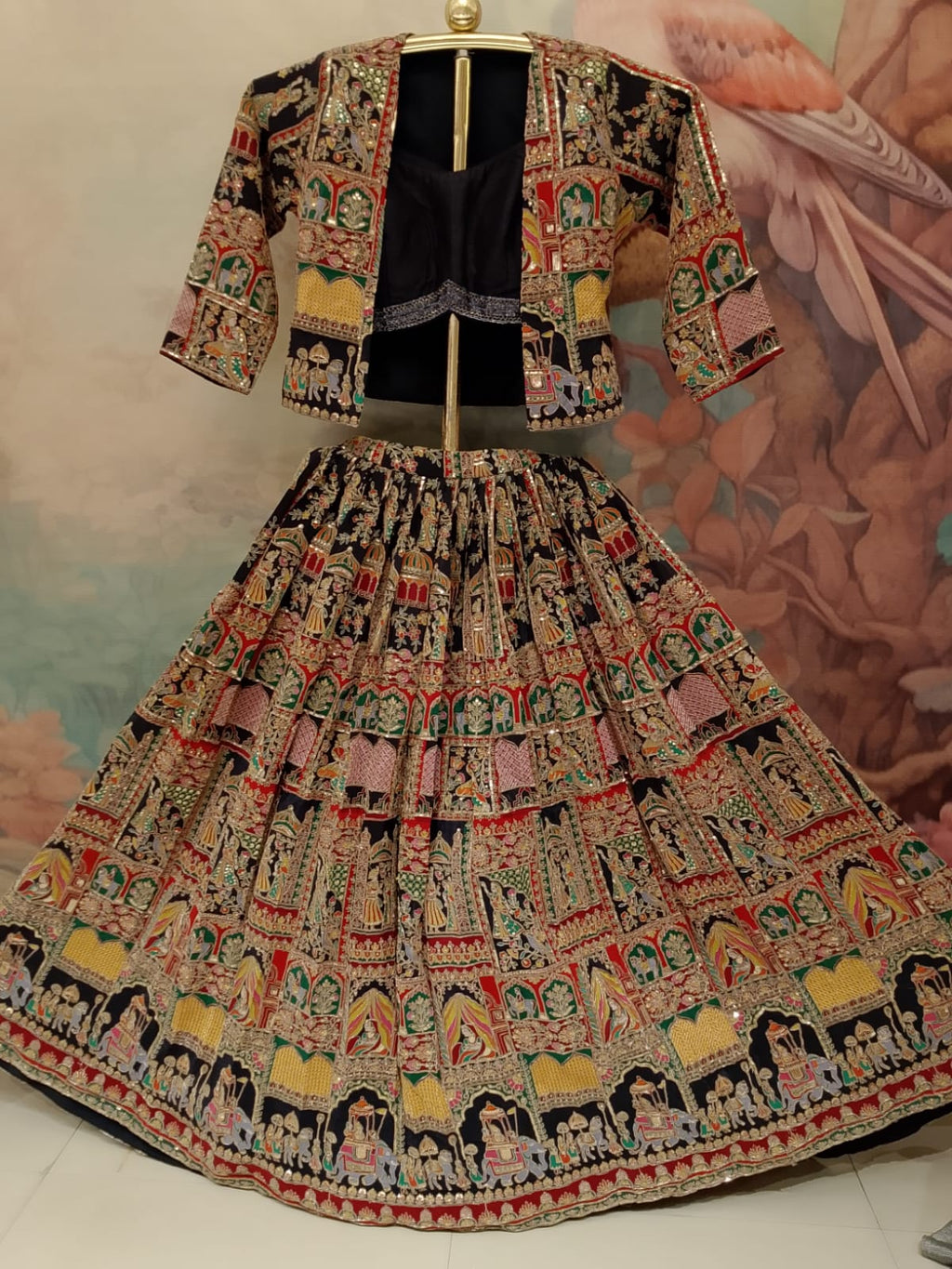 three-piece jacket Satin Silk lehenga set intricate traditional print and embroidery patterns.