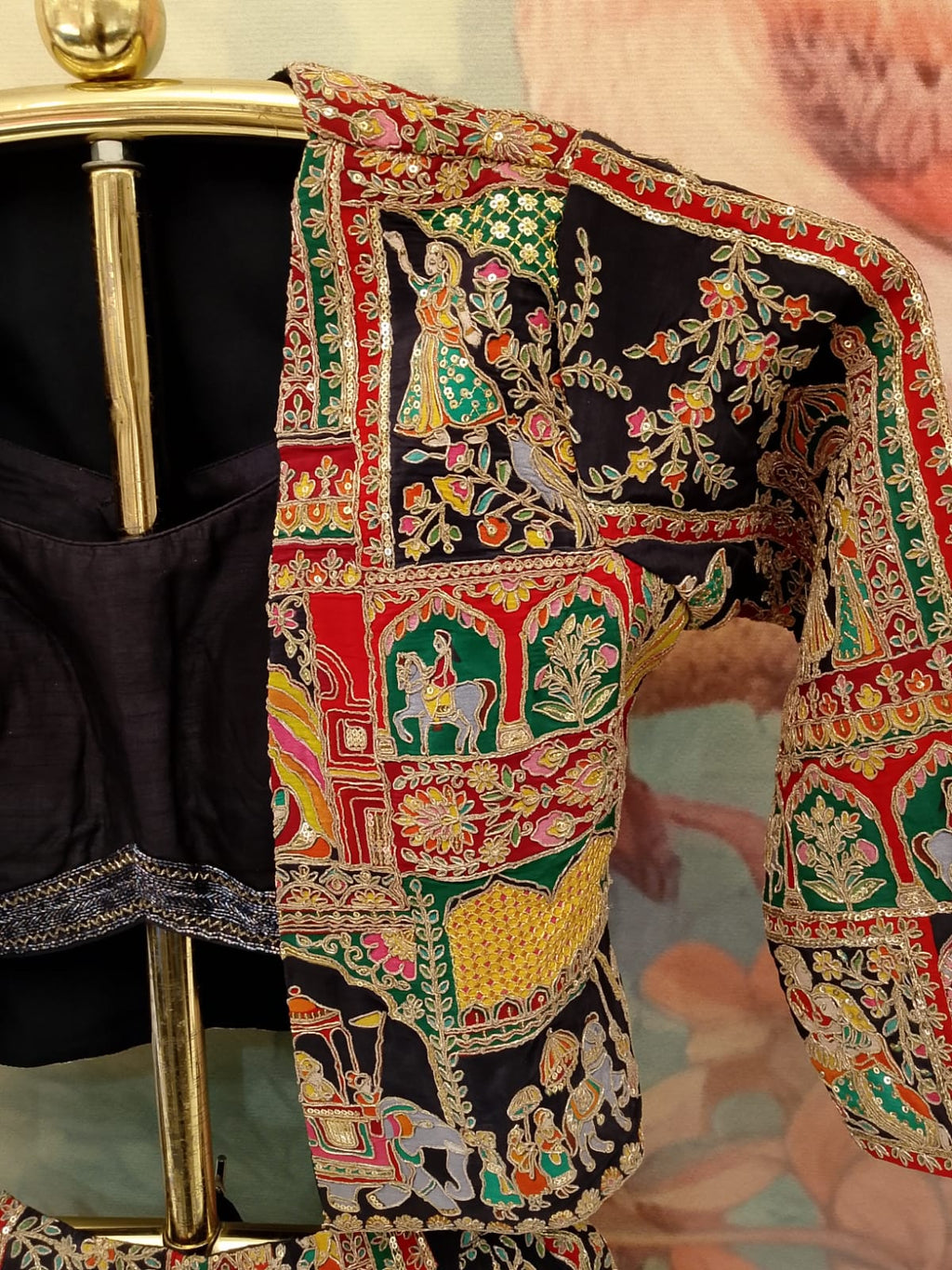 three-piece jacket Satin Silk lehenga set intricate traditional print and embroidery patterns.