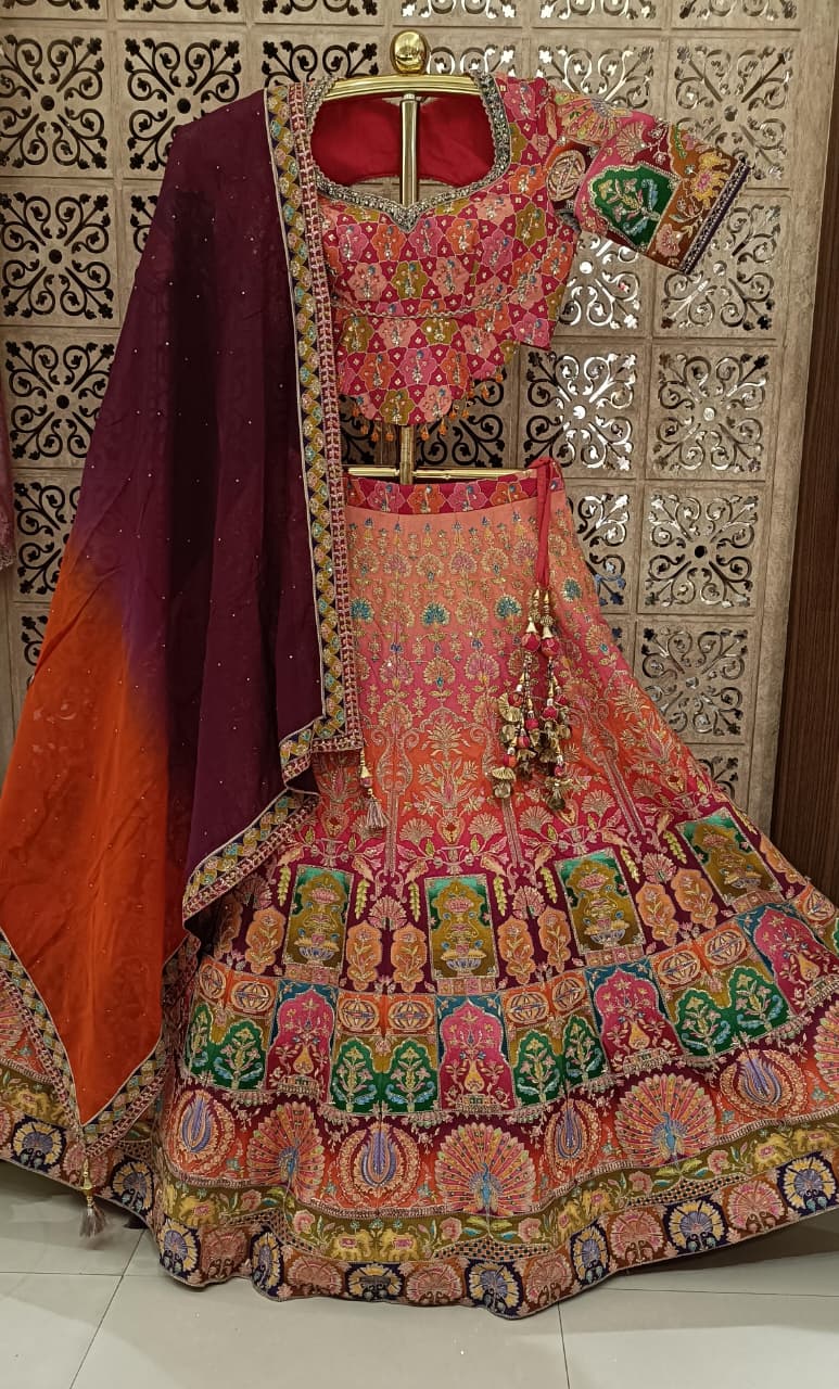 multicolor festive Satin Silk lehenga choli ensemble intricate multi-hued patchwork style embroidery