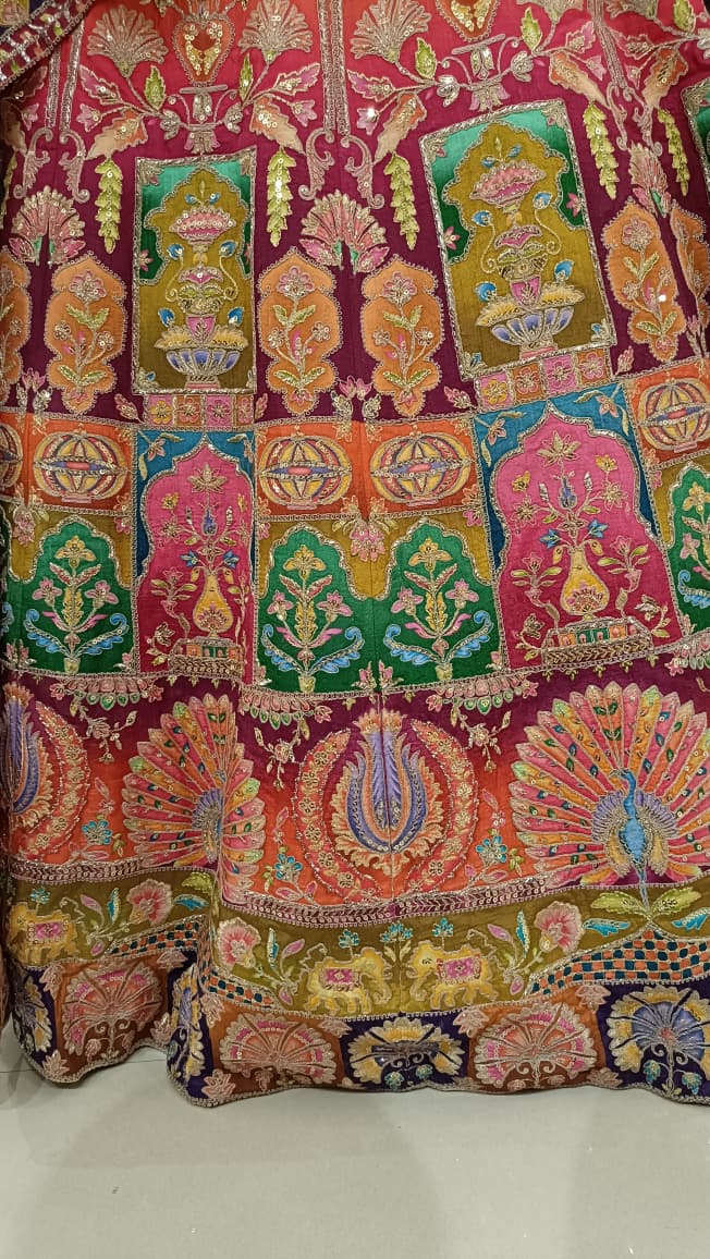 multicolor festive Satin Silk lehenga choli ensemble intricate multi-hued patchwork style embroidery