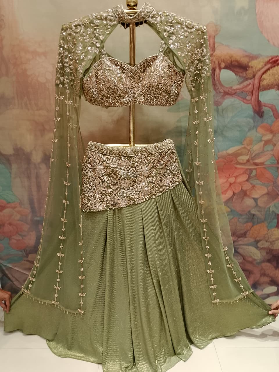 sage green lehenga choli shimmer georgette and sheer net fabrics.