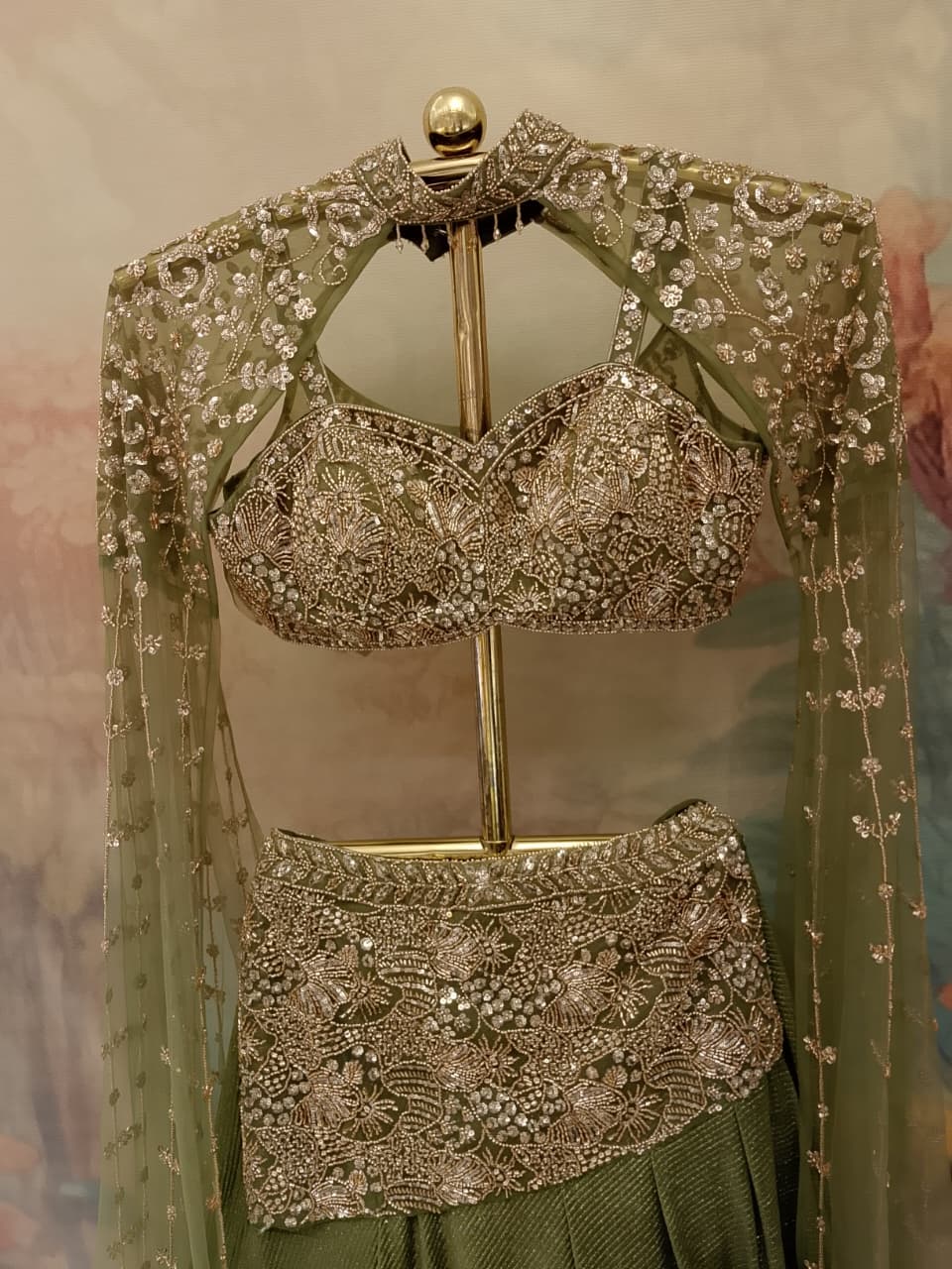 sage green lehenga choli shimmer georgette and sheer net fabrics.
