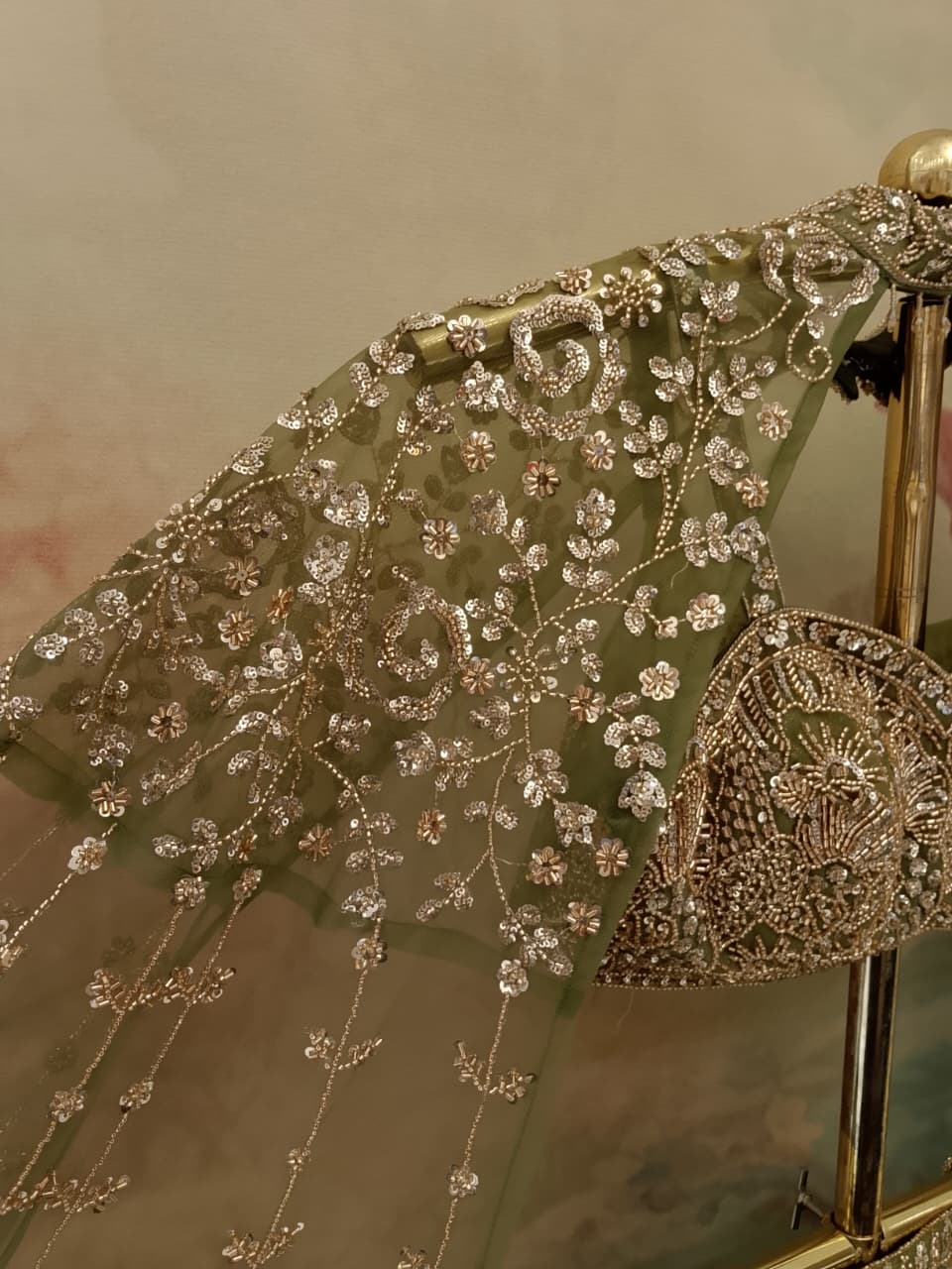 sage green lehenga choli shimmer georgette and sheer net fabrics.