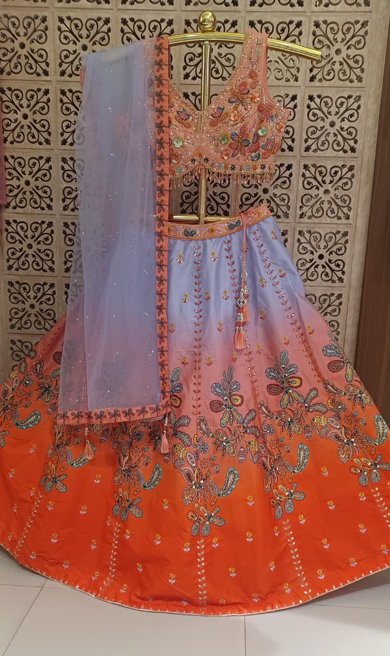 enchanting pastel ombre lehenga choli ensemble Silk  intricate floral embroidery.