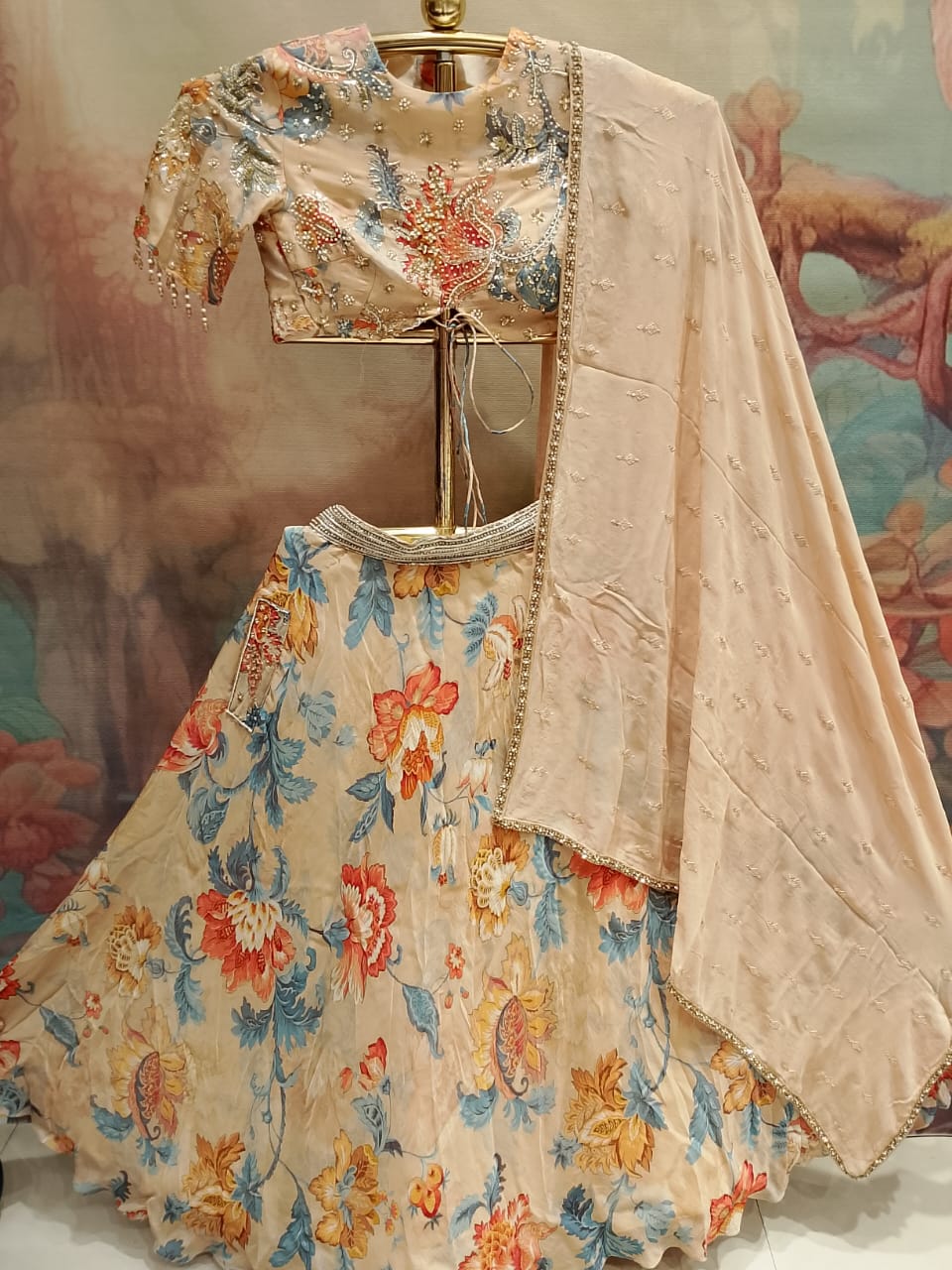 Pastel Peach Floral Georgette Lehenga Choli Set.