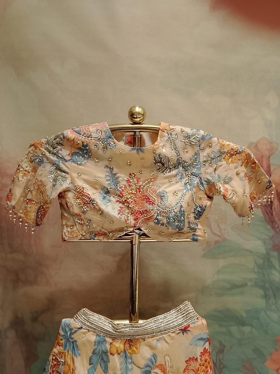 Pastel Peach Floral Georgette Lehenga Choli Set.