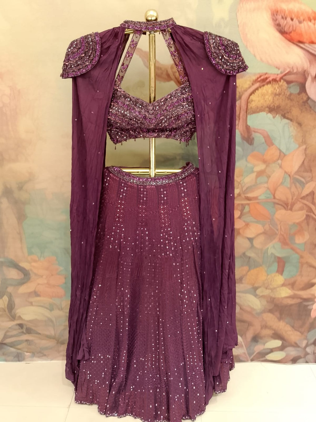 Wine Georgette Cape-Style Lehenga Choli with Hand-Embroidered Blouse.