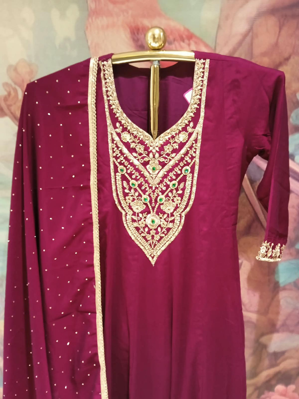 wine-colored, three-piece traditional ethnic Satin Silk suit set Anarkali kurta, dupatta with gold borders.