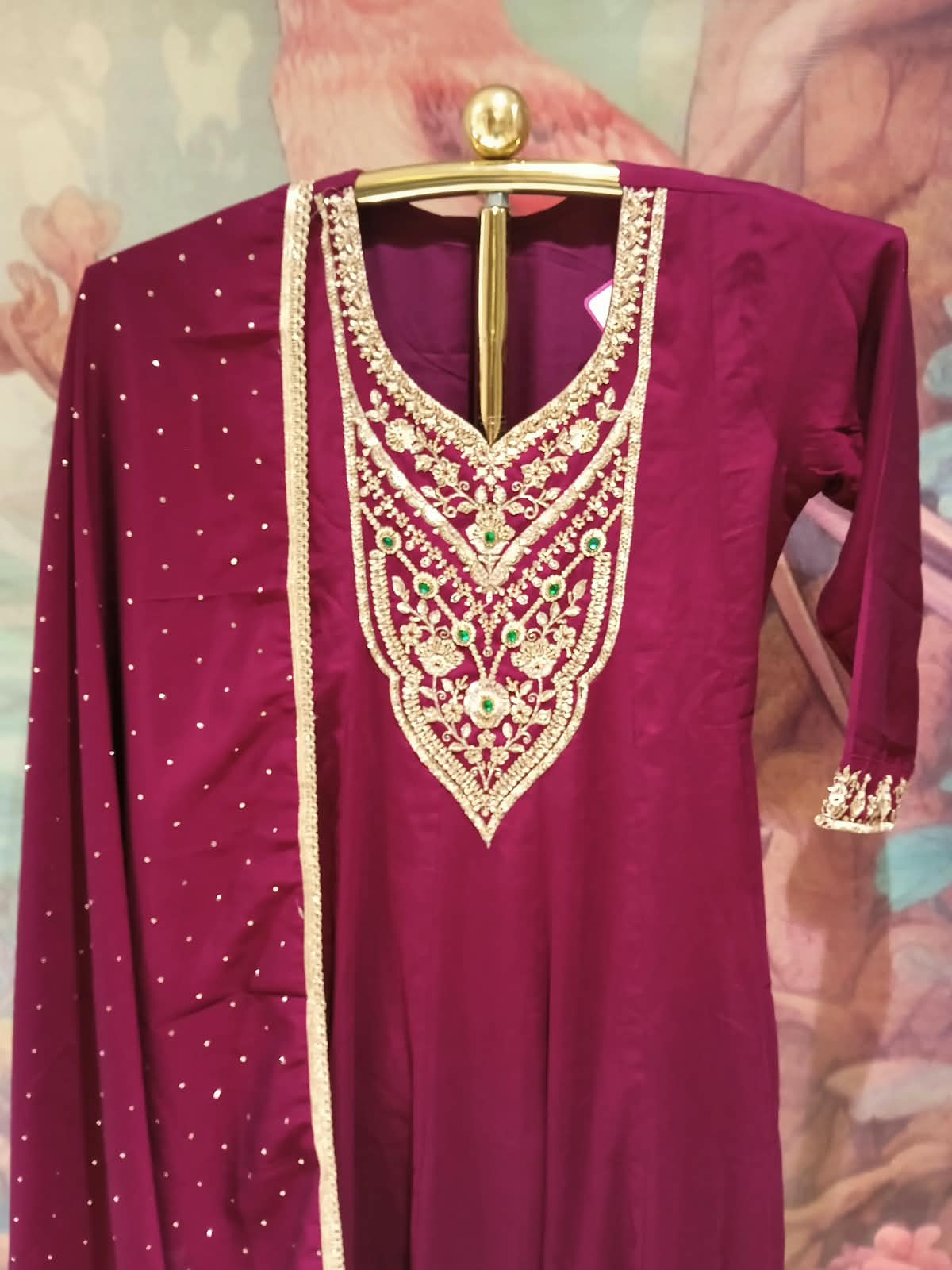 wine-colored, three-piece traditional ethnic Satin Silk suit set Anarkali kurta, dupatta with gold borders.
