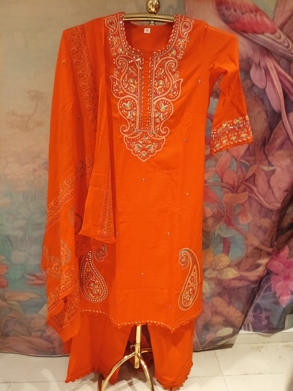 Radiant Tangerine Paisley Embroidered Mul Cotton Kurta Set.