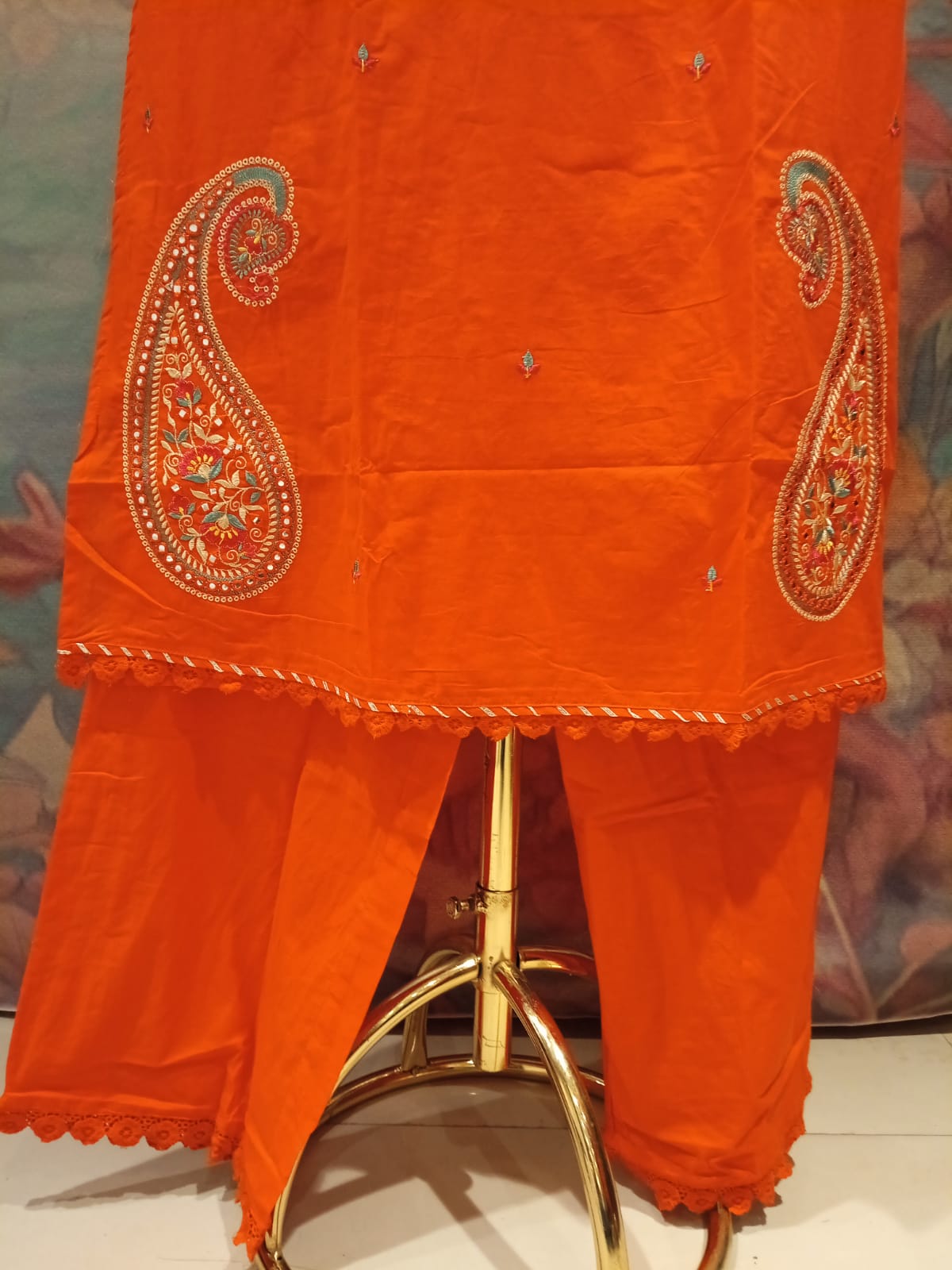 Radiant Tangerine Paisley Embroidered Mul Cotton Kurta Set.