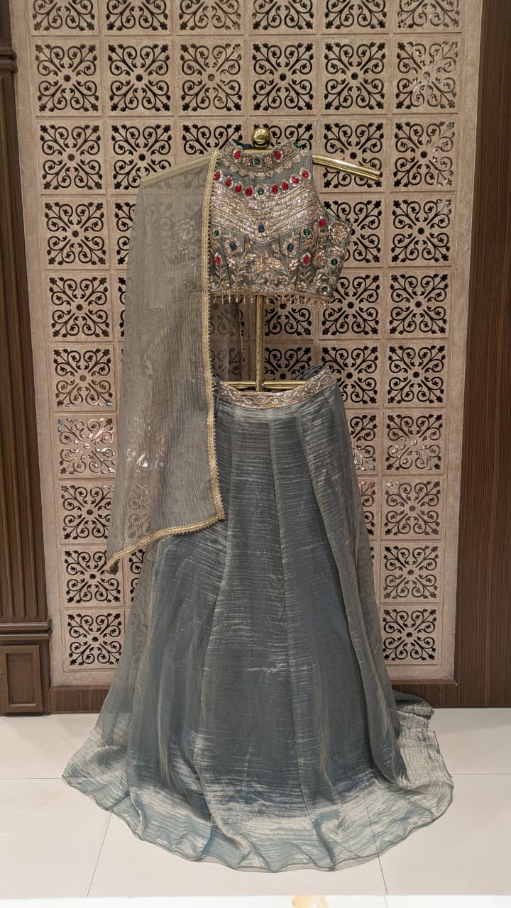 Elegant Grey Lehenga Set with Multicolour Embellished Blouse.