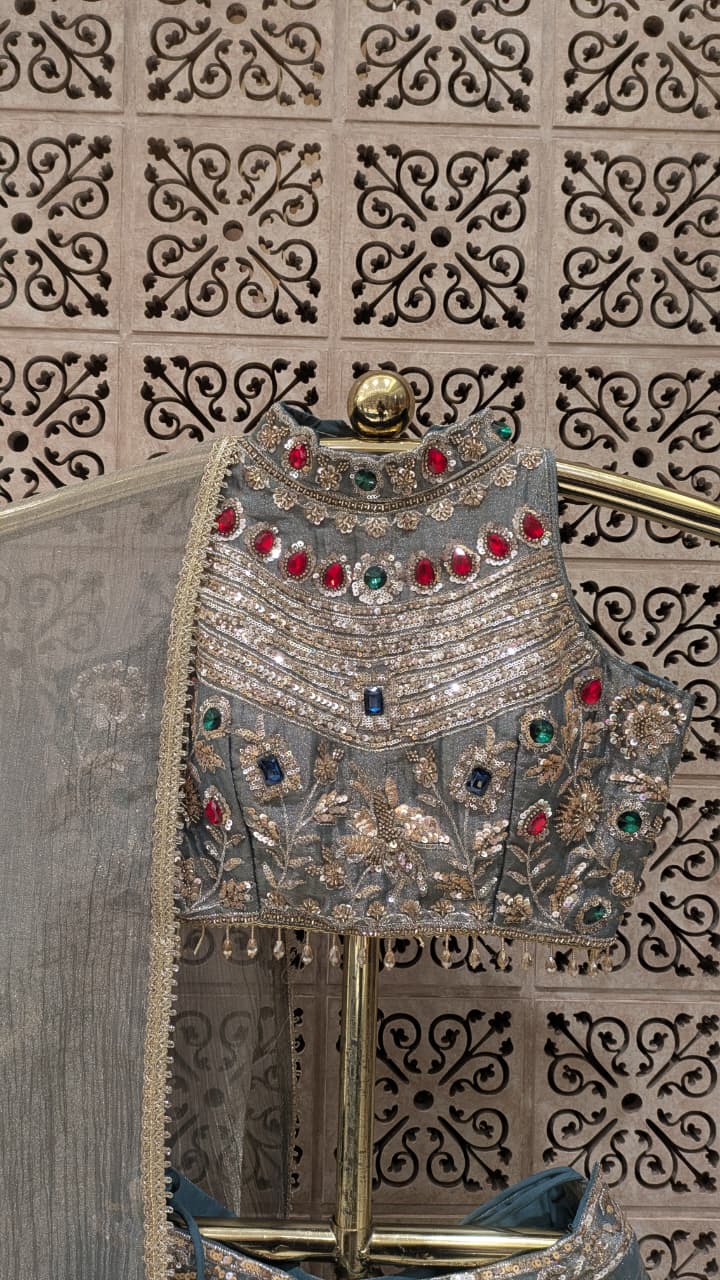 Elegant Grey Lehenga Set with Multicolour Embellished Blouse.