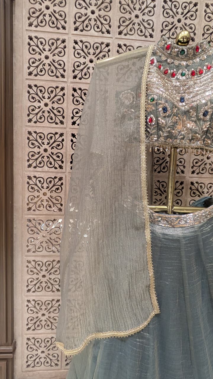 Elegant Grey Lehenga Set with Multicolour Embellished Blouse.