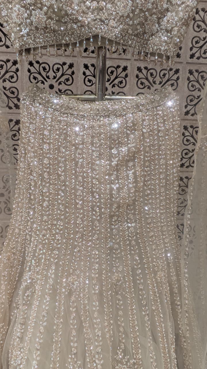 Ethereal Golden Fish-Cut Lehenga Choli Set.