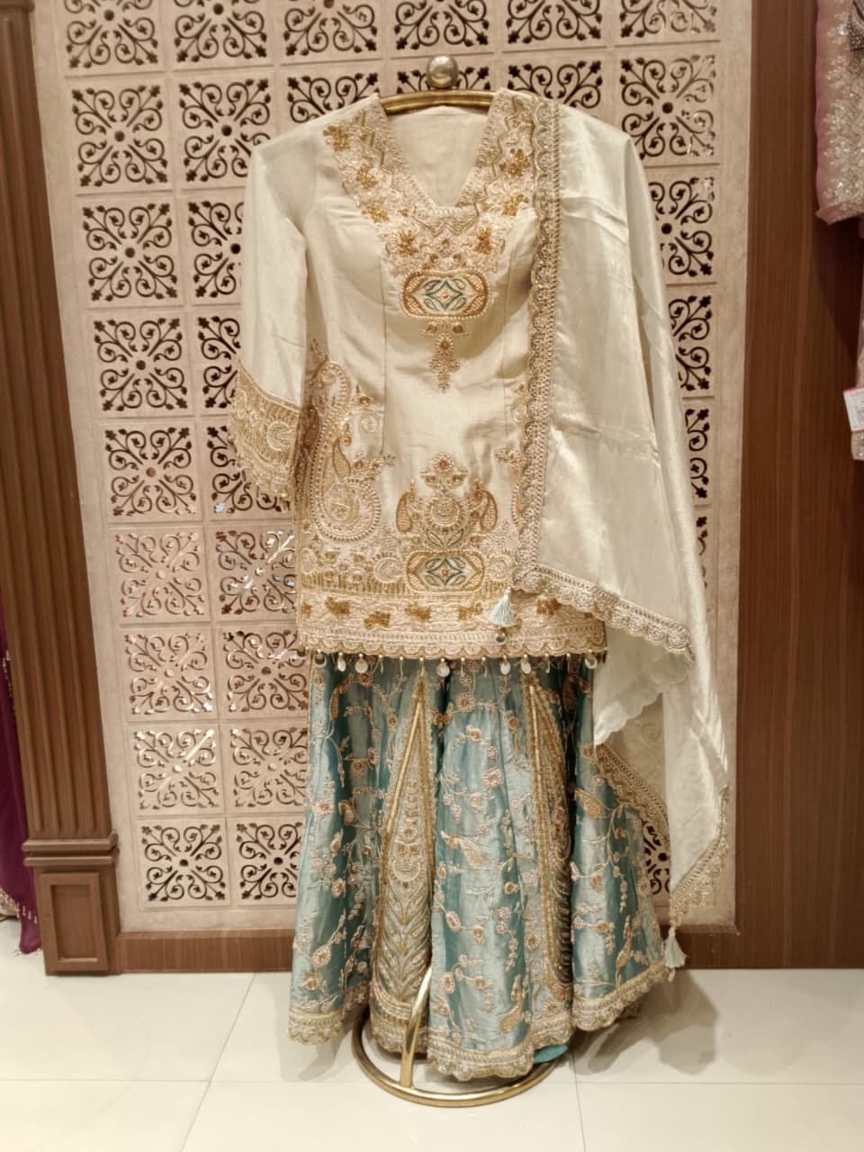 Majestic Ivory & Sage Green Simmer Silk Embroidered Gharara Suit Set.