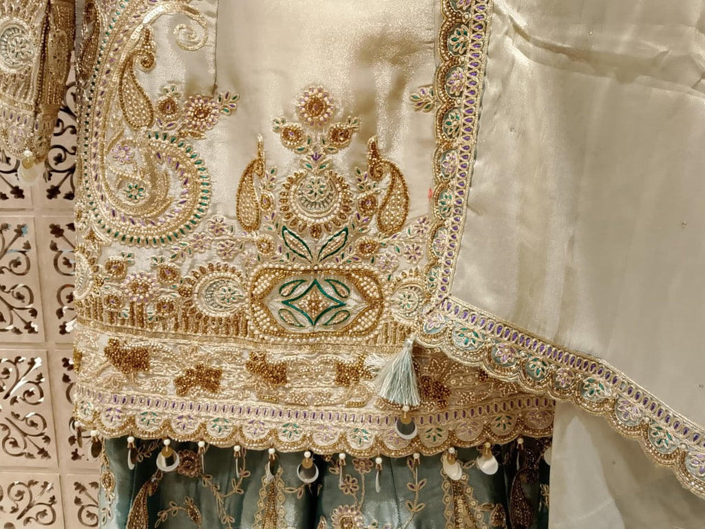 Majestic Ivory & Sage Green Simmer Silk Embroidered Gharara Suit Set.