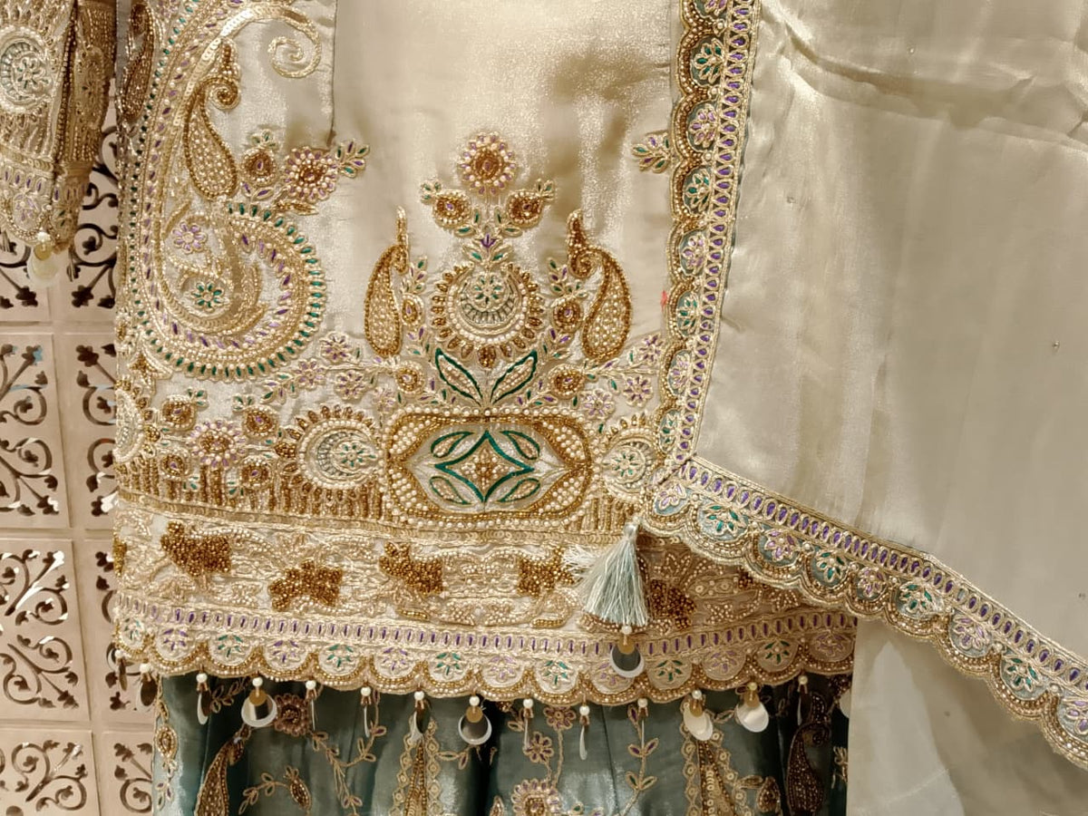 Majestic Ivory & Sage Green Simmer Silk Embroidered Gharara Suit Set.