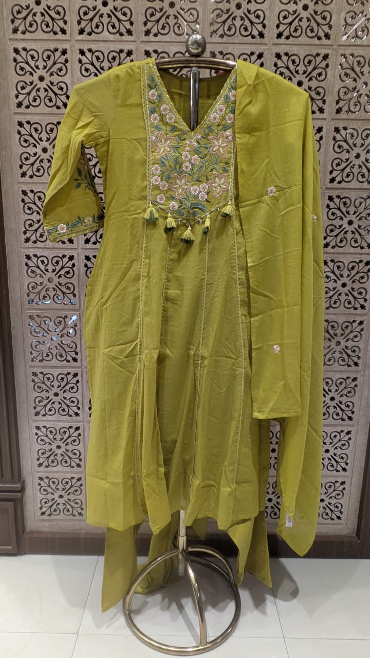 mehendi green Anarkali-style Mul Cotton kurta set.