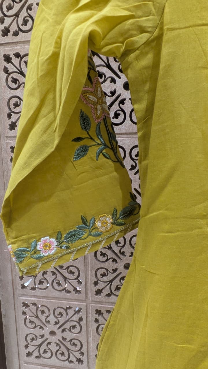 mehendi green Anarkali-style Mul Cotton kurta set.