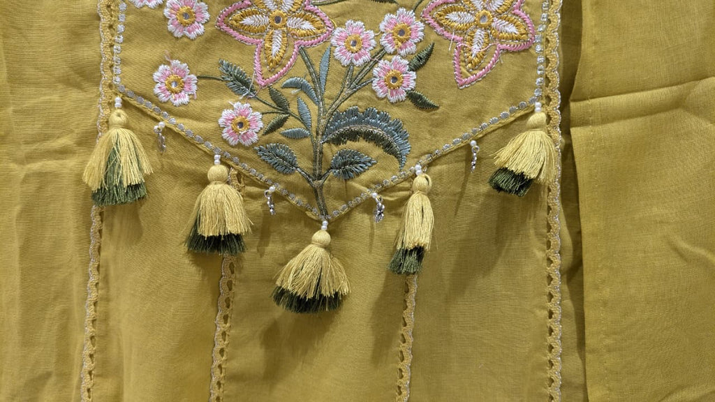 mehendi green Anarkali-style Mul Cotton kurta set.