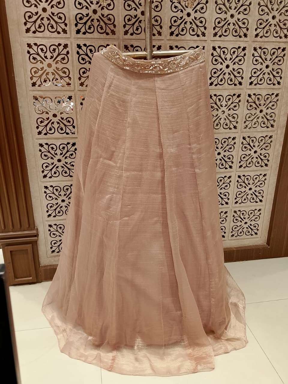 Blush Pink Organza Lehenga Choli with Embroidered Halter Blouse.