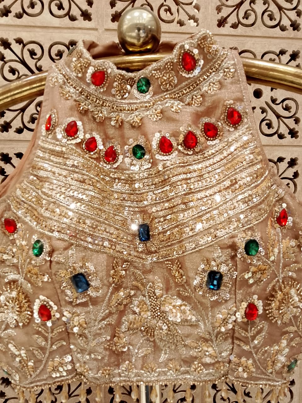Blush Pink Organza Lehenga Choli with Embroidered Halter Blouse.