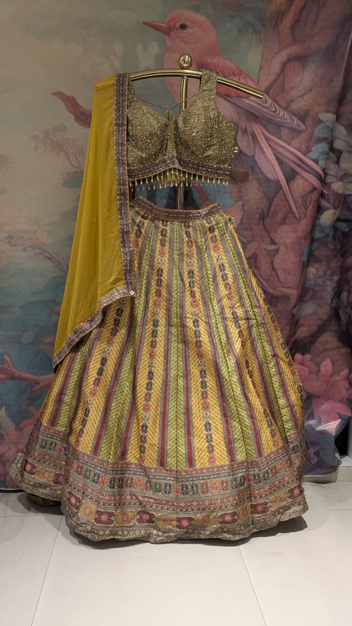 Radiant Ochre & Olive Gold Embellished Silk Lehenga Set.