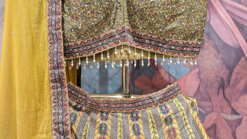 Radiant Ochre & Olive Gold Embellished Silk Lehenga Set.