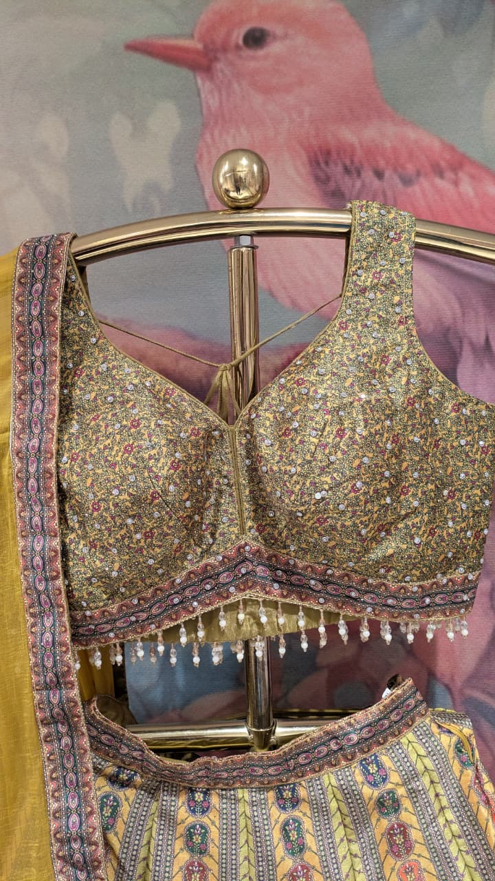 Radiant Ochre & Olive Gold Embellished Silk Lehenga Set.