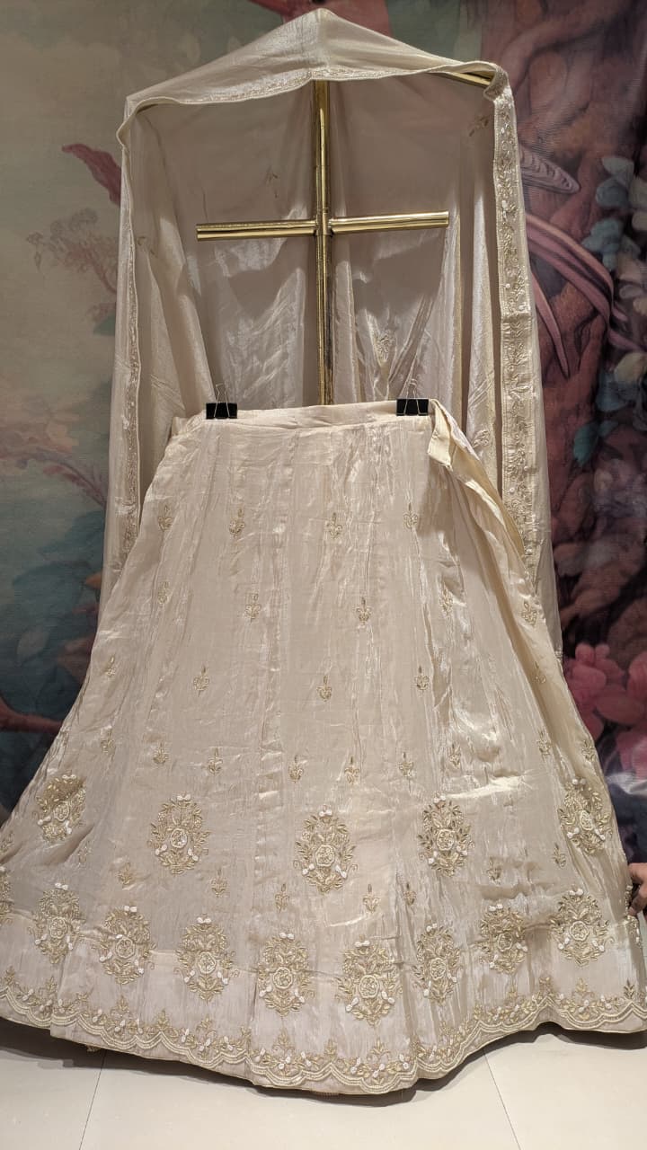 Unstitched Ivory Simmer Silk Lehenga Set with Delicate Zardozi Work.