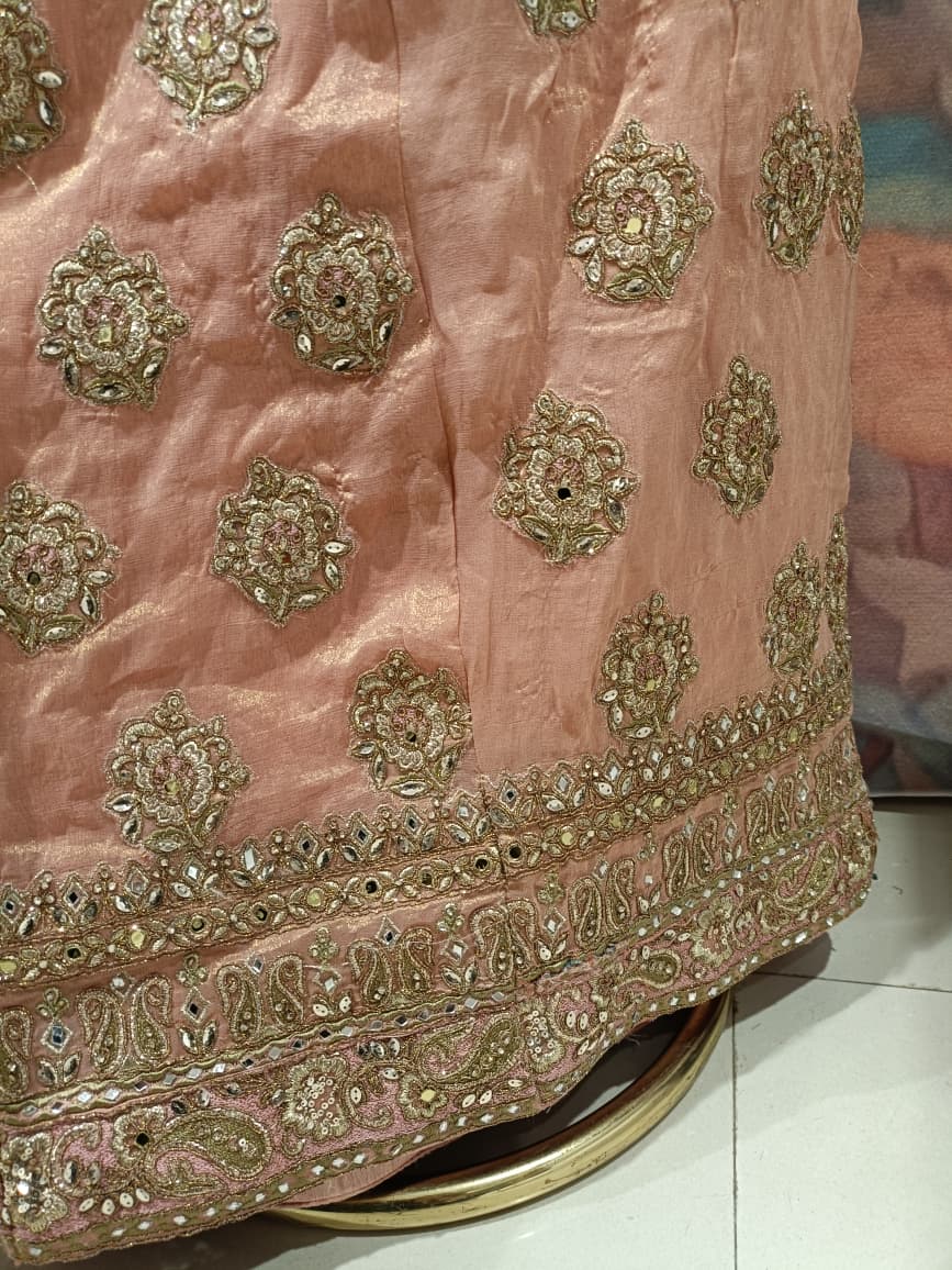 Pastel Peach Heavily Embellished Simmer Silk Short Kurta and Palazzo Ensemble.