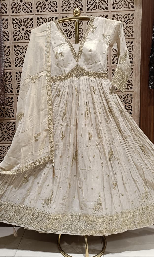 Ivory Simmer Silk Gown with Intricate Gold Zardozi.