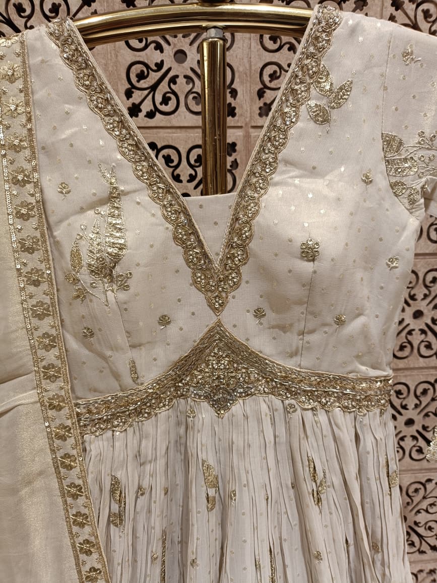 Ivory Simmer Silk Gown with Intricate Gold Zardozi.