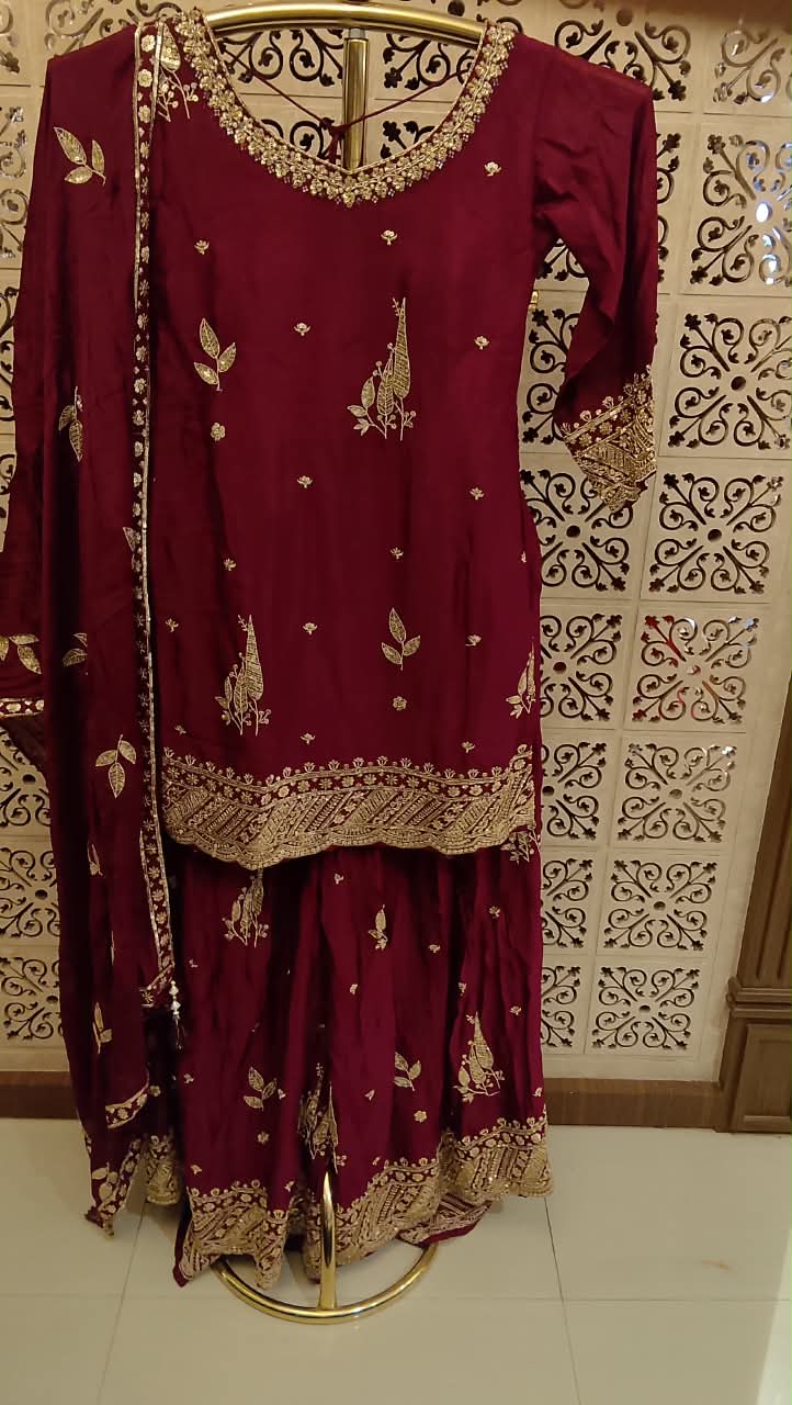 Deep Maroon Heavily Embellished Kurta and Flared Palazzo Ensemble.