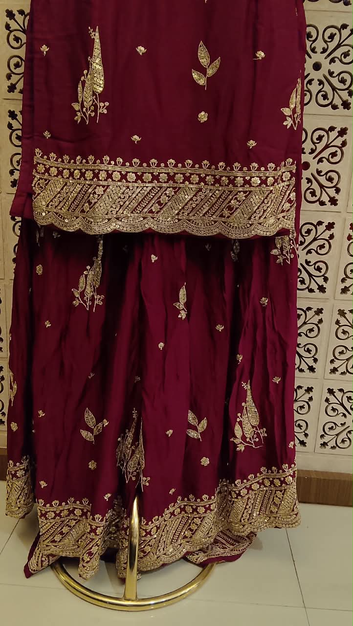 Deep Maroon Heavily Embellished Kurta and Flared Palazzo Ensemble.