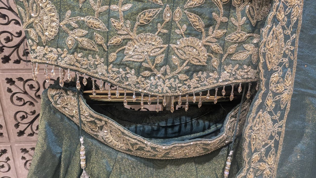 Sage Green & Antique Gold Heavily Embellished Simmer Silk Bridal Lehenga Set.