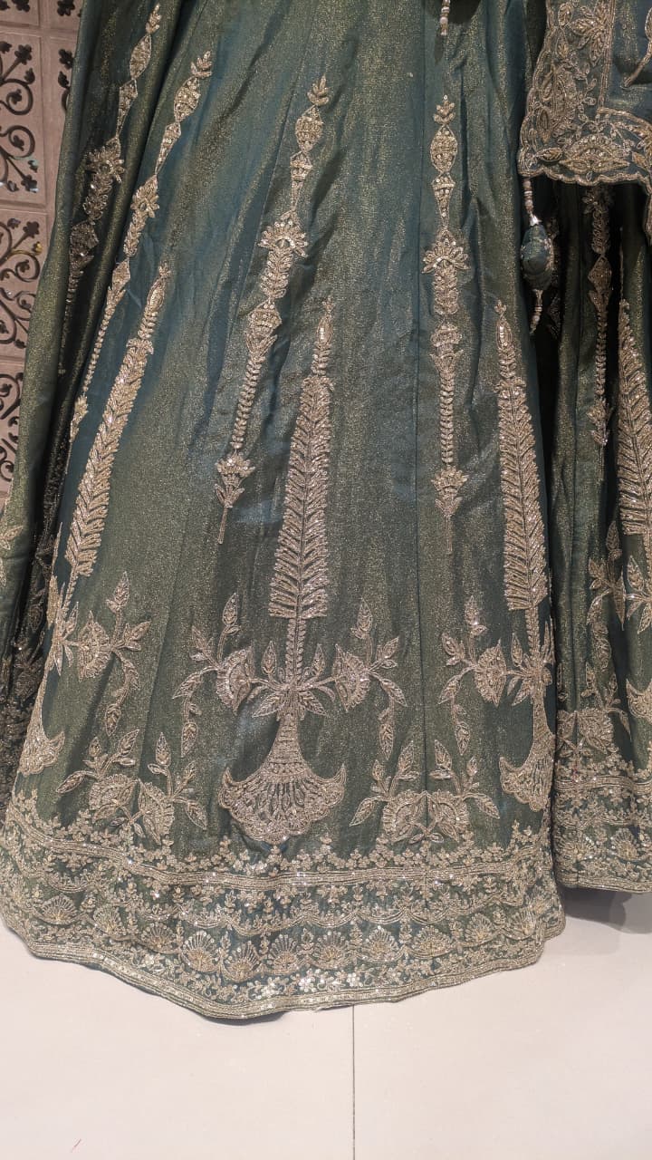 Sage Green & Antique Gold Heavily Embellished Simmer Silk Bridal Lehenga Set.