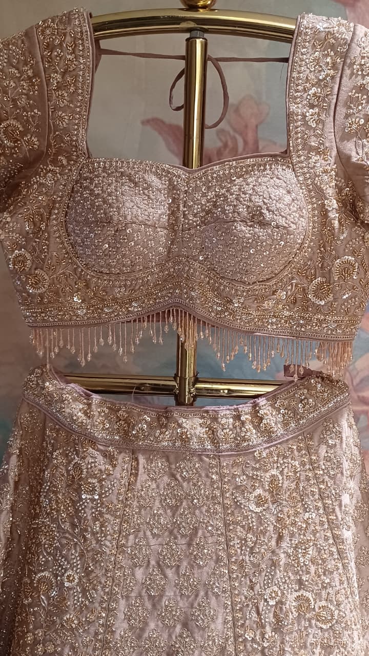 Premium Dusty Rose Pink Simmer Silk Bridal Lehenga with Hand Zardozi Borders.