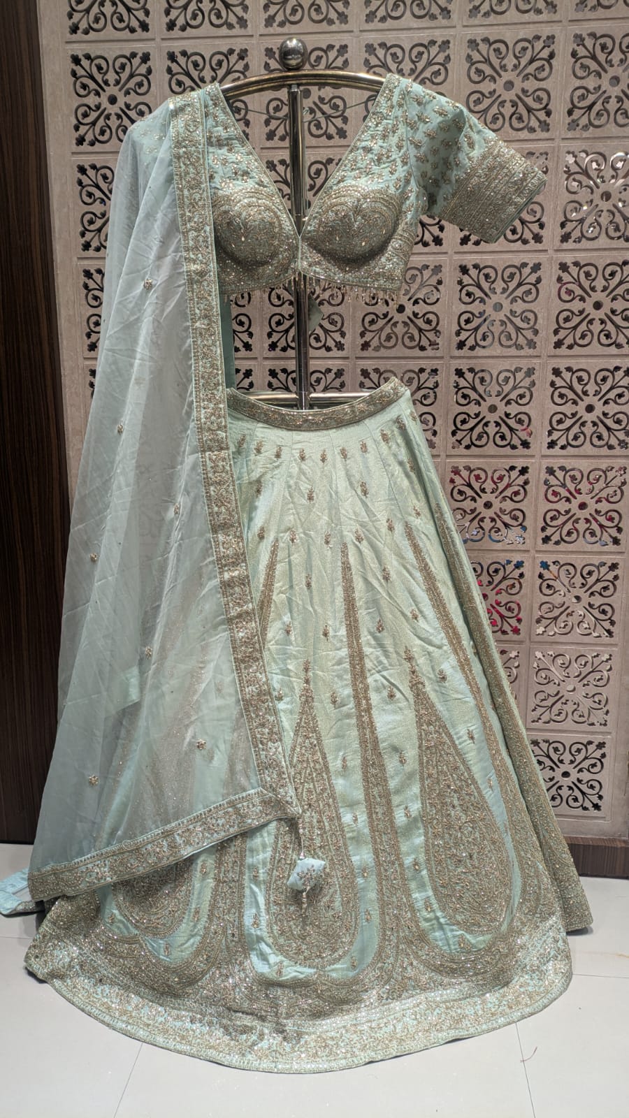 Premium Hand-Embellished Mint Simmer Silk Bridal Ensemble with Paisley Borders.