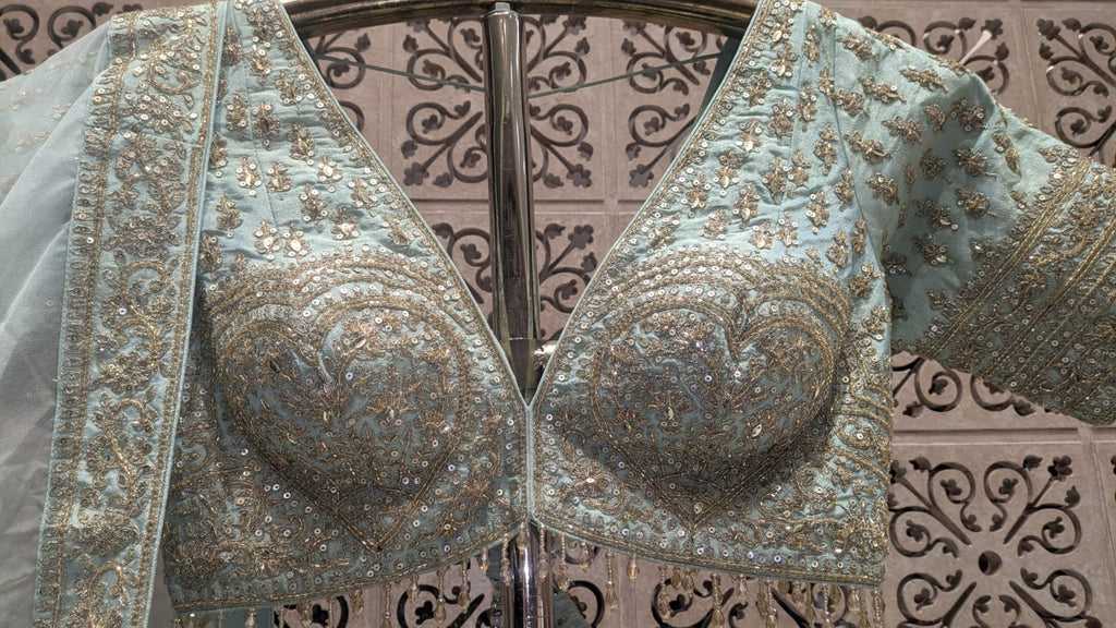 Premium Hand-Embellished Mint Simmer Silk Bridal Ensemble with Paisley Borders.