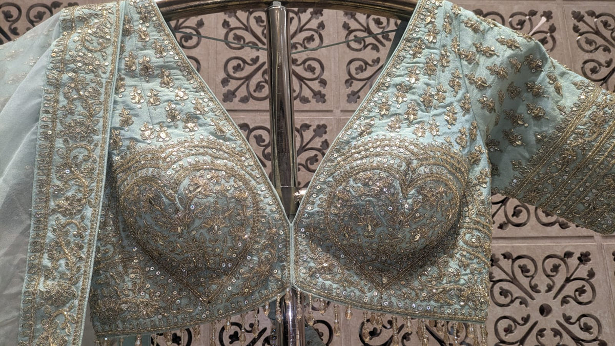 Premium Hand-Embellished Mint Simmer Silk Bridal Ensemble with Paisley Borders.