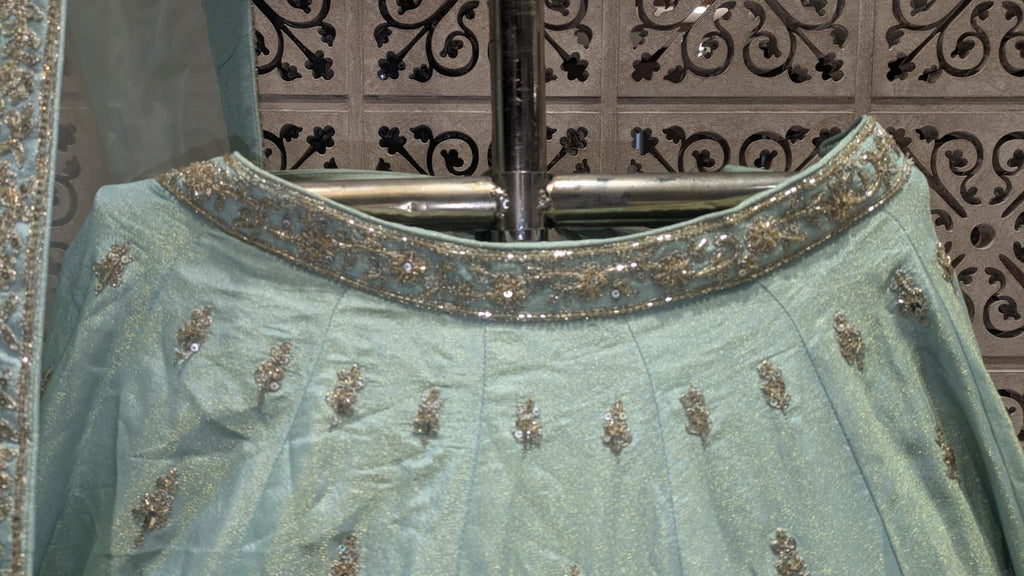 Premium Hand-Embellished Mint Simmer Silk Bridal Ensemble with Paisley Borders.
