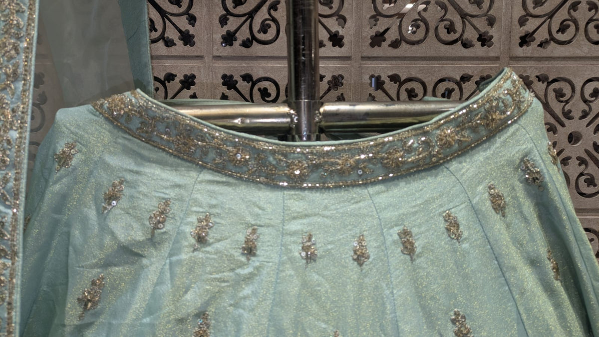 Premium Hand-Embellished Mint Simmer Silk Bridal Ensemble with Paisley Borders.